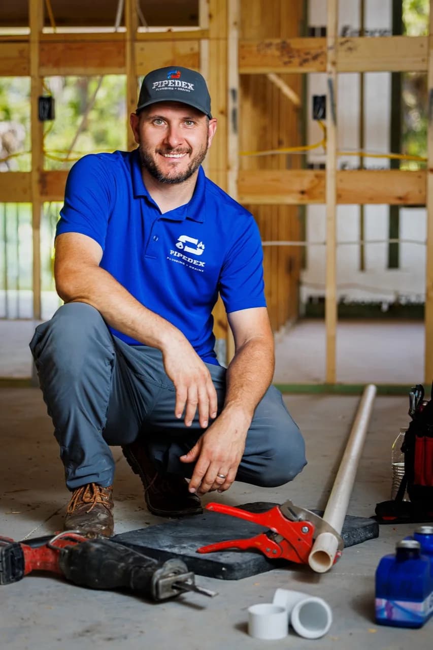 Pipedex plumbing technician ready for a Southwest Florida service call